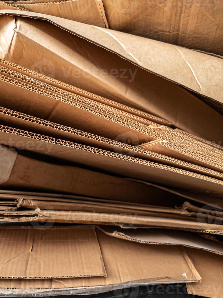 Close-up view of stacked corrugated cardboard layers, showcasing the intricate wave structure and texture, ideal for concepts like packaging, recycling, industry, and material design photo