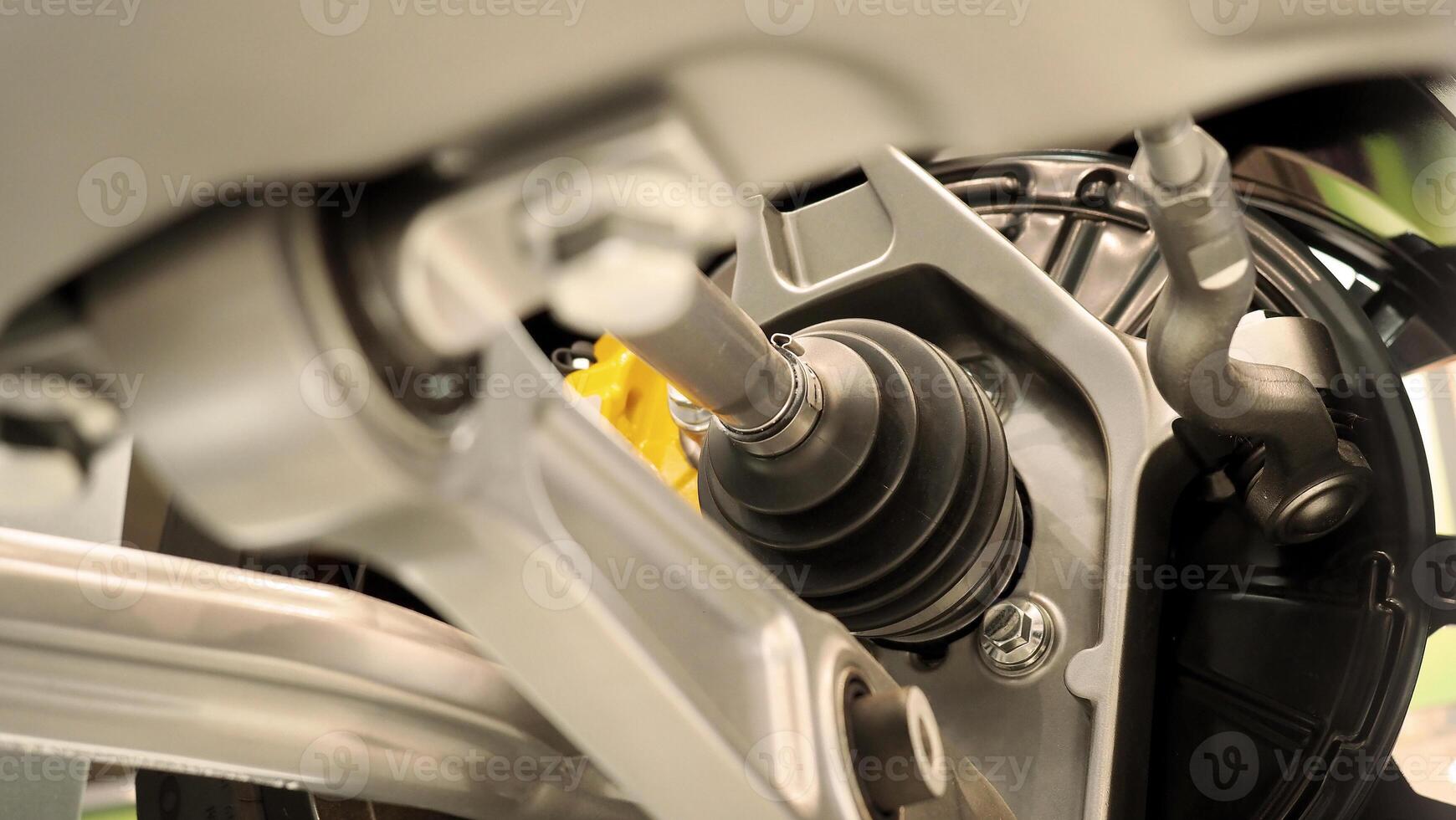 Car suspension and drive shaft. Structure of EV car spare parts. Such as Front or Rear suspension Shock absorber suspension Brake. Elements of the suspension and Chassis structure. Car service repair. photo