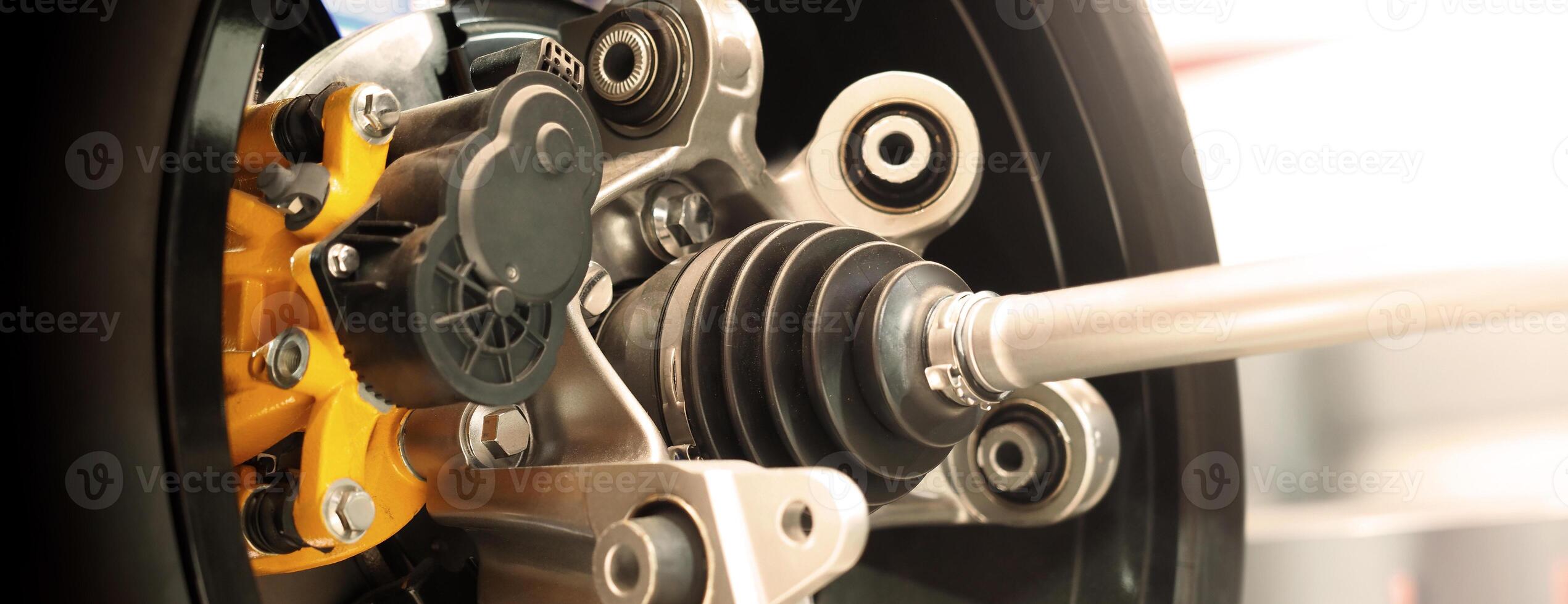 Car suspension and drive shaft. Structure of EV car spare parts. Such as Front or Rear suspension Shock absorber suspension Brake. Elements of the suspension and Chassis structure. Car service repair. photo