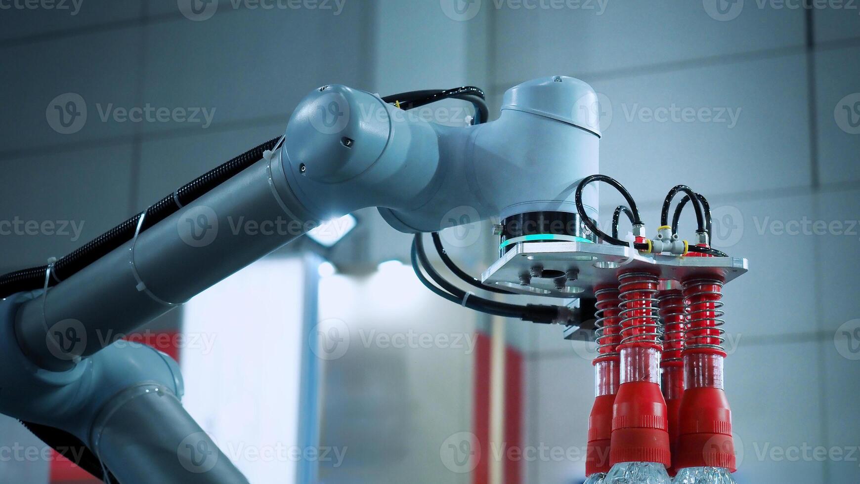 Robot arm Automation technology. Tools for saving energy effort and making the work of engineers more convenient in modern factories. Automation factory tech concept with robotic arms lifting goods. photo