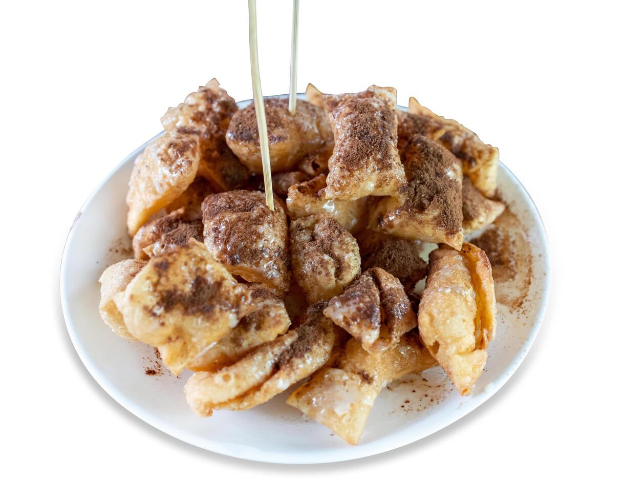 Top view of roti topped with coco powder and condensed milk, focus selective photo