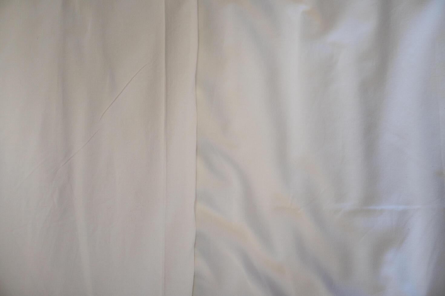 Background and textured of Overlapping white floor tiles in the middle. Use for blankets or pillowcases. photo