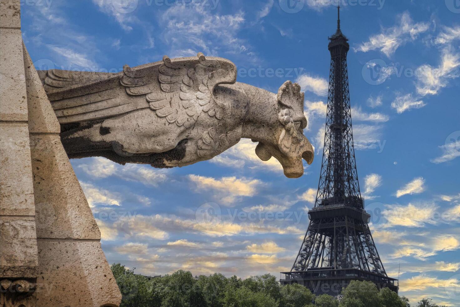 composite of images Eiffel Tower and gargoyle morning view of Paris photo