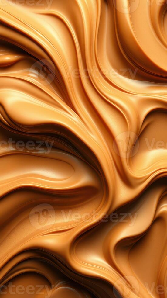 Wavy patterns of smooth caramel-colored substance create an intriguing visual texture photo