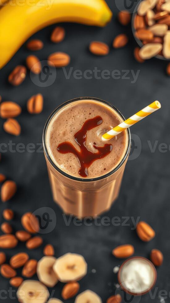 Smooth and refreshing coffee banana smoothie with caramel drizzle, nuts, and fresh ingredients on dark background photo