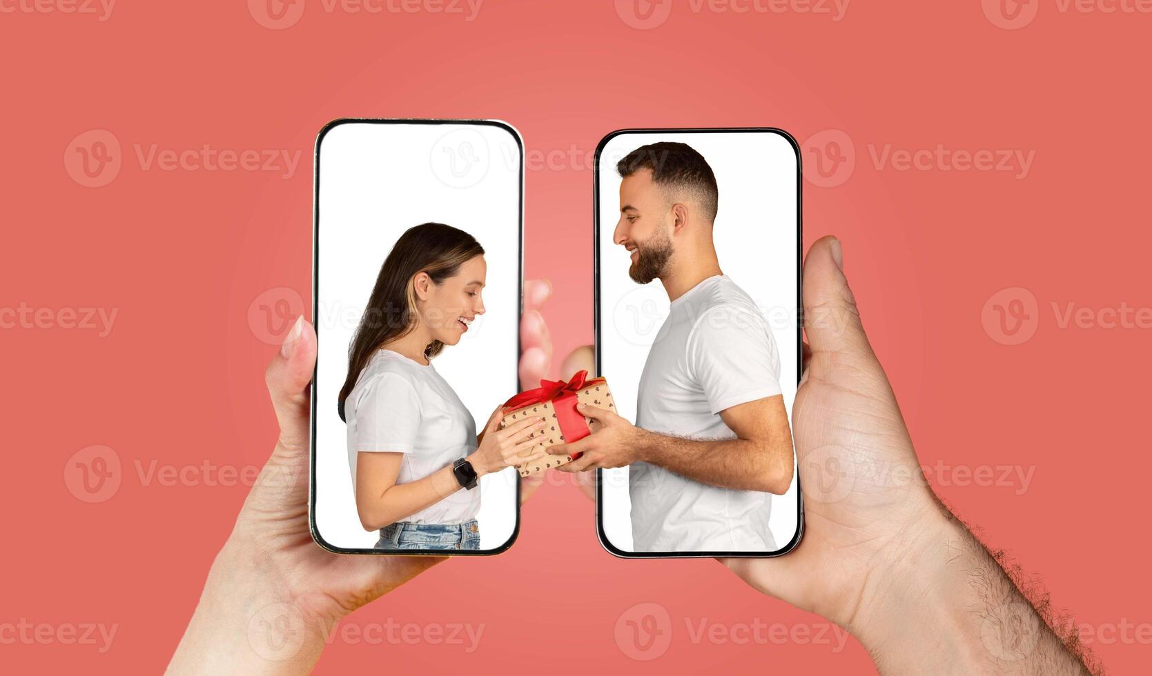 A couple communicates affection via their smartphones, exchanging heartfelt messages and gifts. Their hands touch the screens, symbolizing connection and love in a digital world. photo