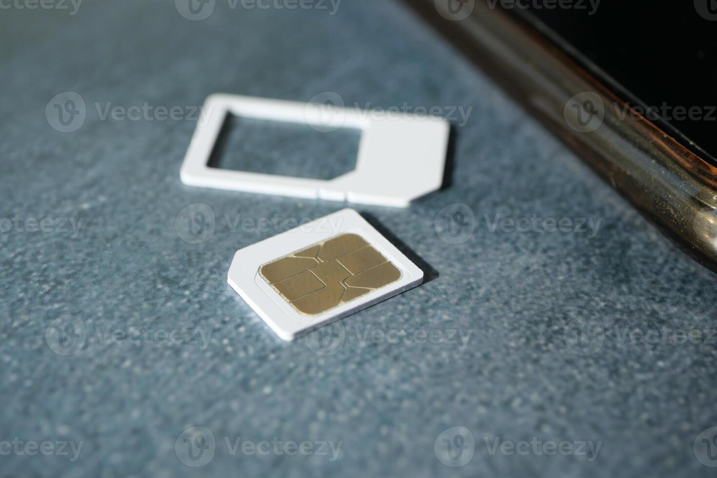 A sim card for a smart phone on table photo