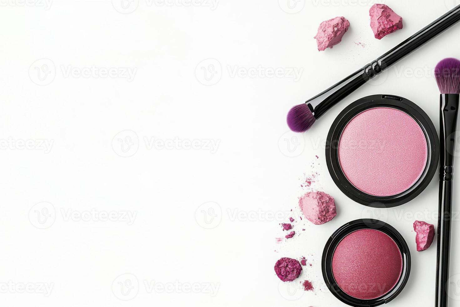 Burgundy lipstick, pink blush, and lavender eyeshadow arranged stylishly alongside black brushes on a clean white background ideal for beauty enthusiasts photo