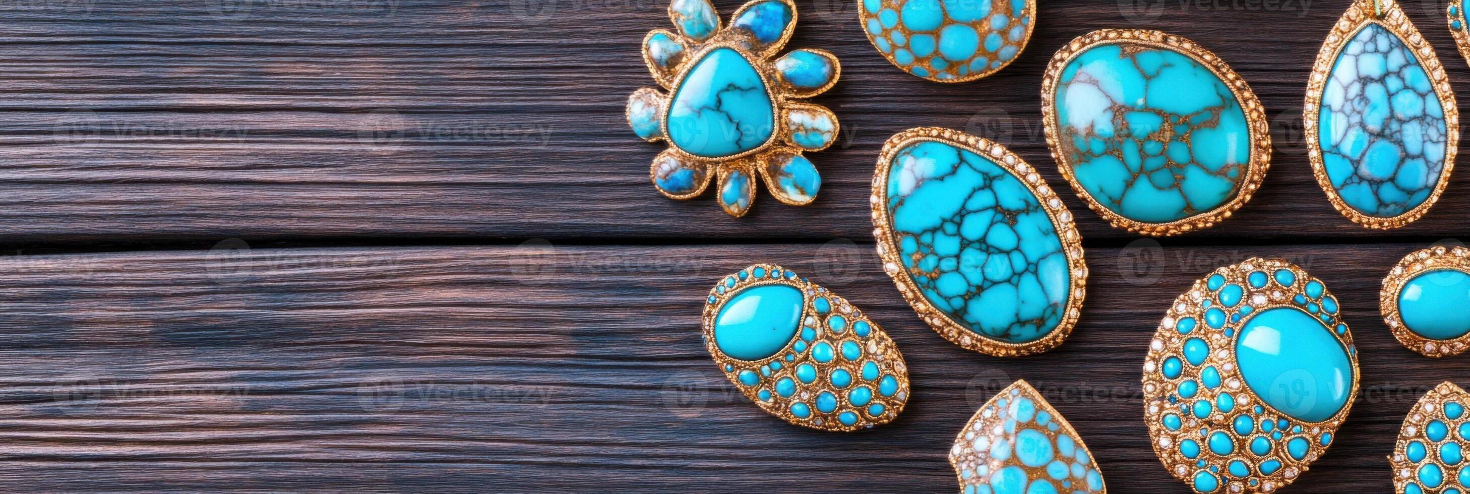 Artisanal jewelry flat lay featuring turquoise stones on a dark wooden surface with coral accents photo