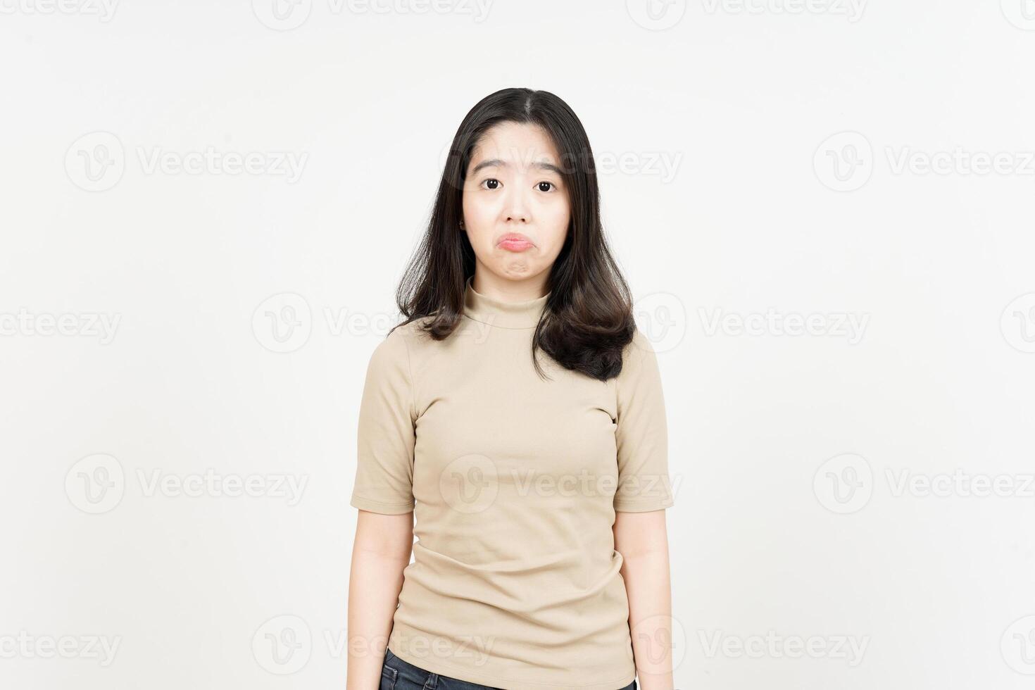 Looking to camera with sad face expression Of Beautiful Asian Woman Isolated On White Background photo