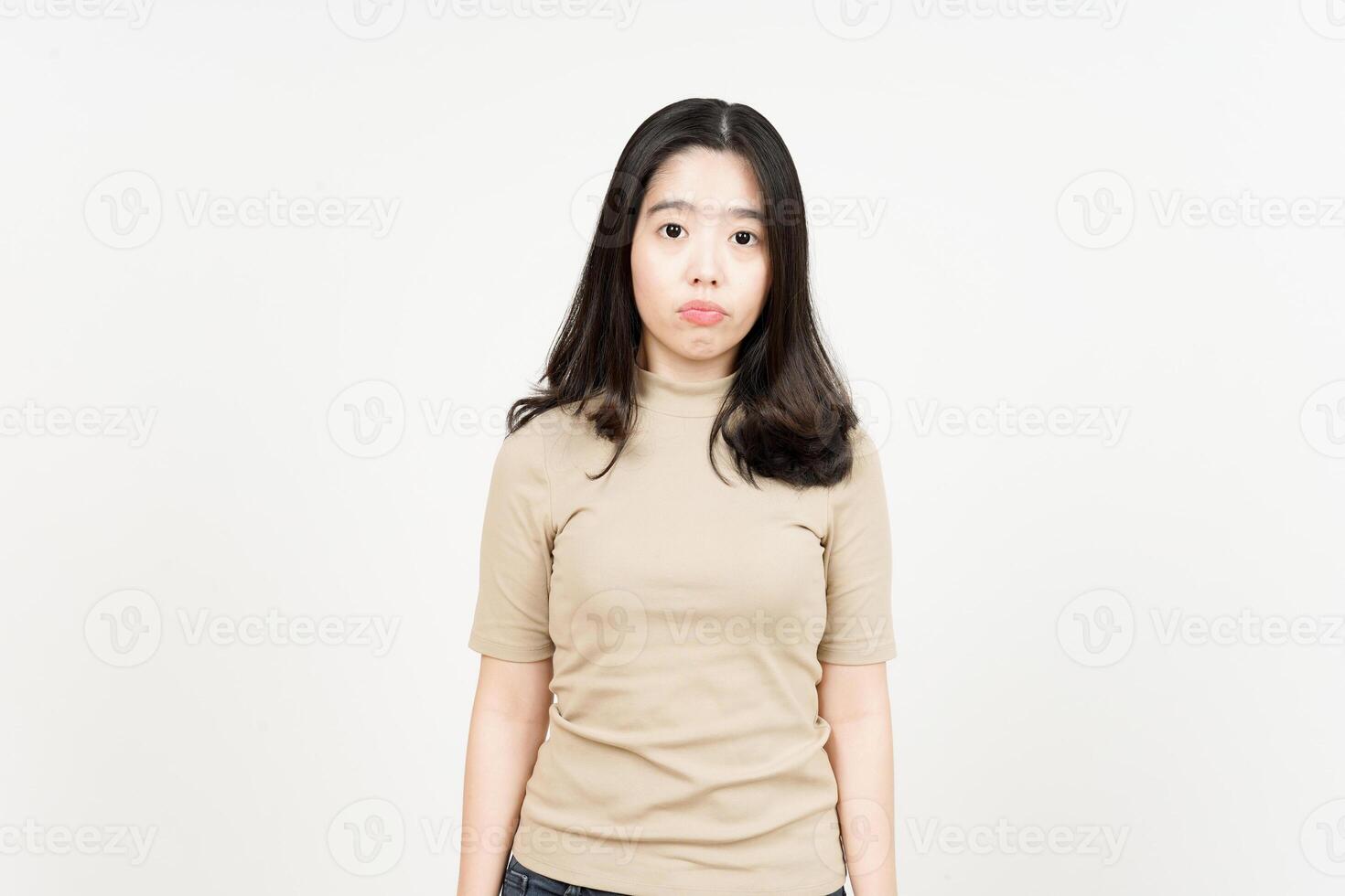 Looking to Camera with Expressionless Face Of Beautiful Asian Woman Isolated On White Background photo