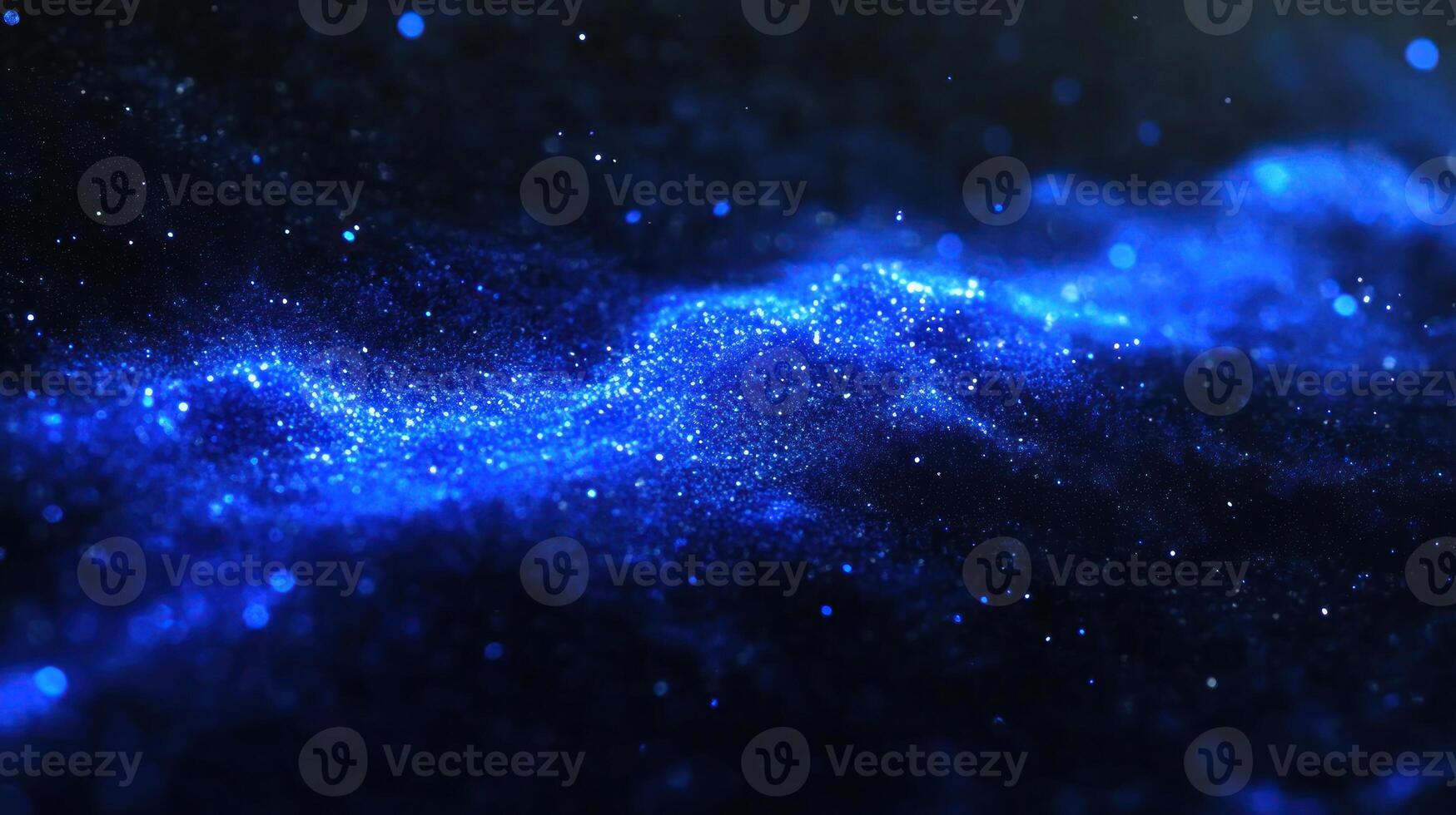 Sparkling blue cosmic dust forms a mesmerizing pattern in the vast darkness of space photo