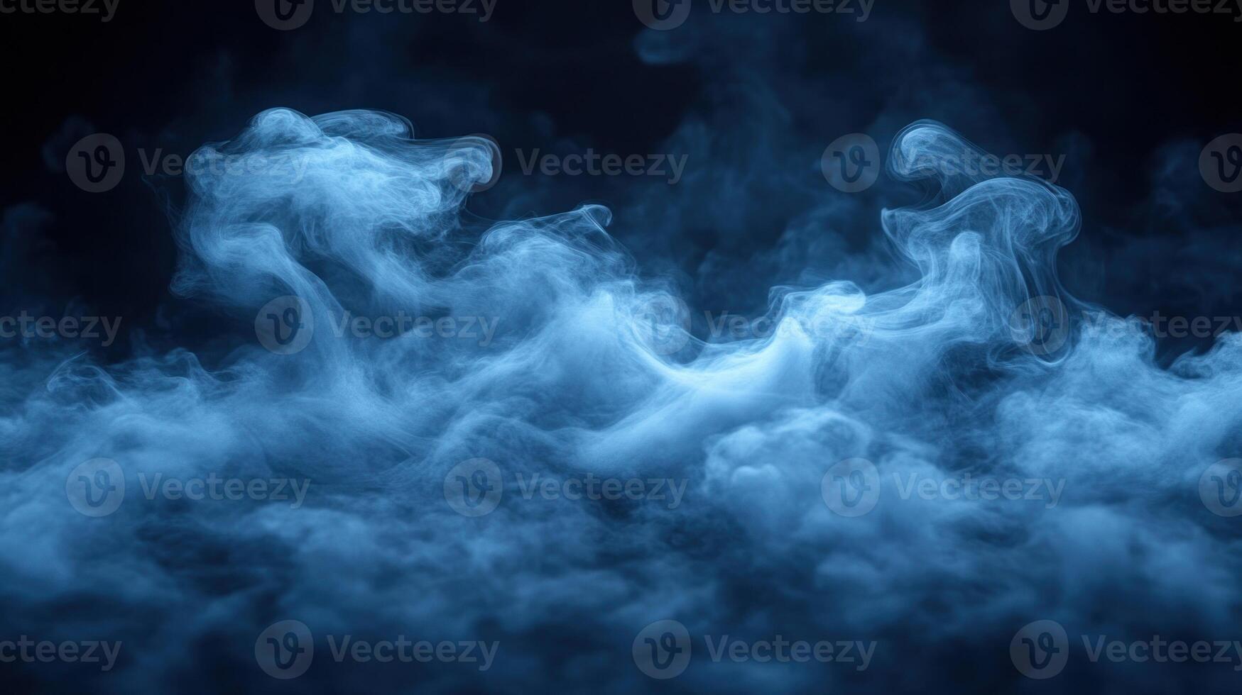 The soothing blue fog glides gracefully, enveloping the air with a serene and mystical presence photo