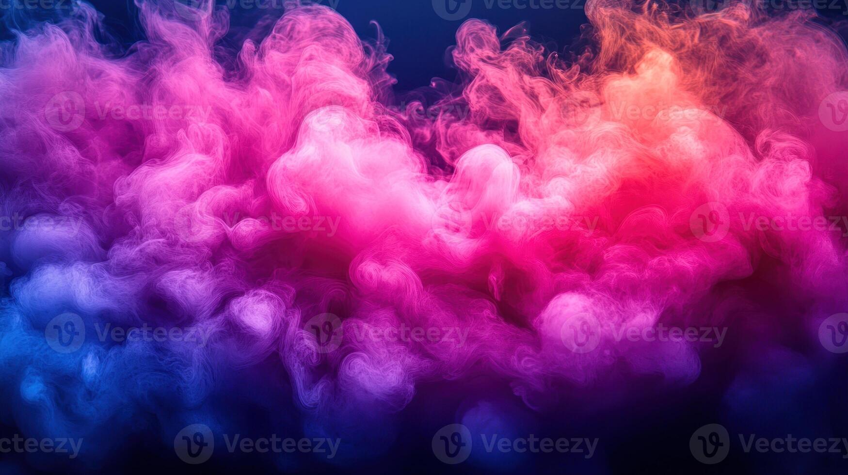 Swirling clouds of vibrant pink and purple smoke create a mesmerizing effect against a dark background photo