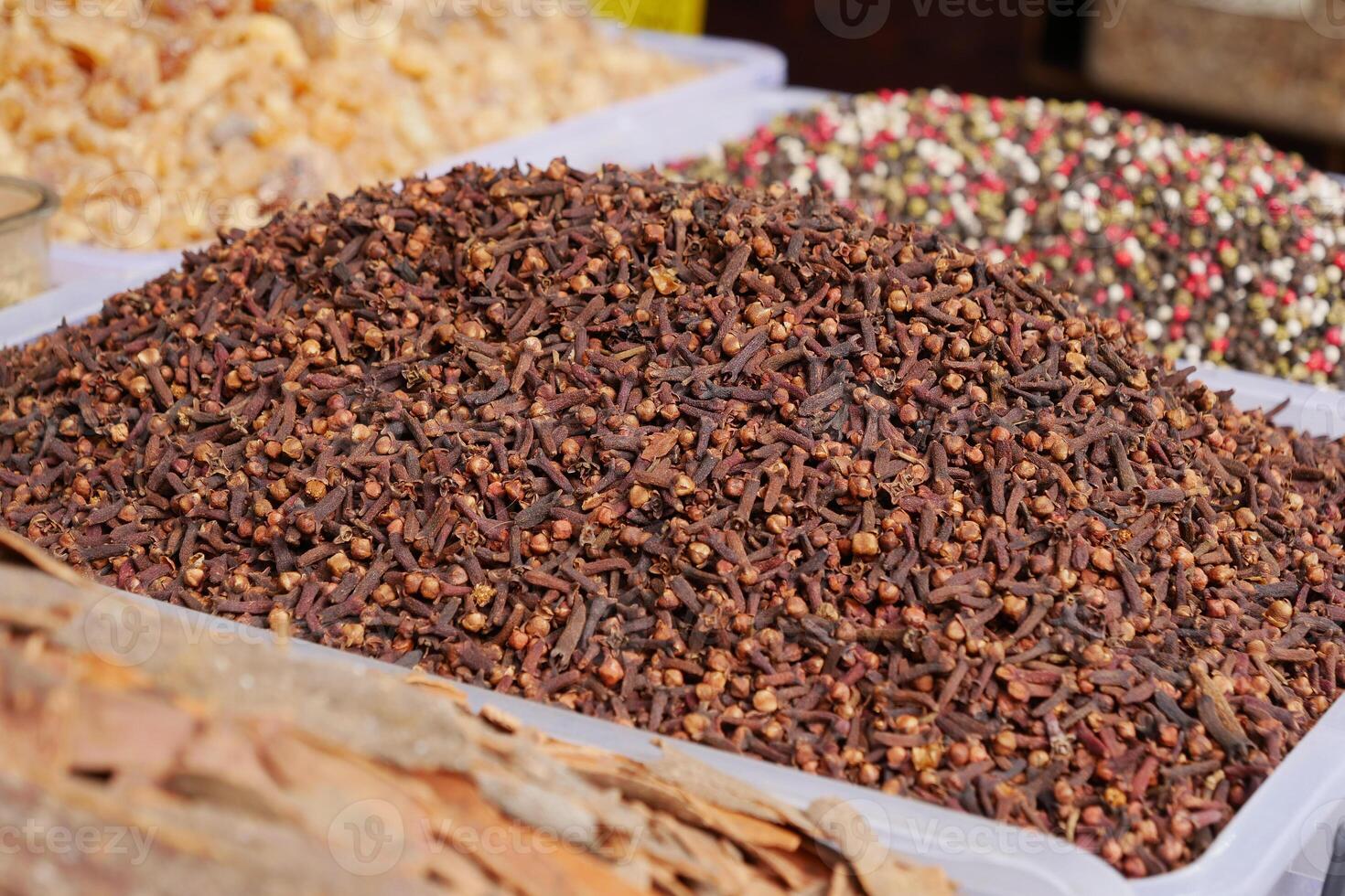 Fragrant and Dried Cloves on Display in a Lively Spice Market photo
