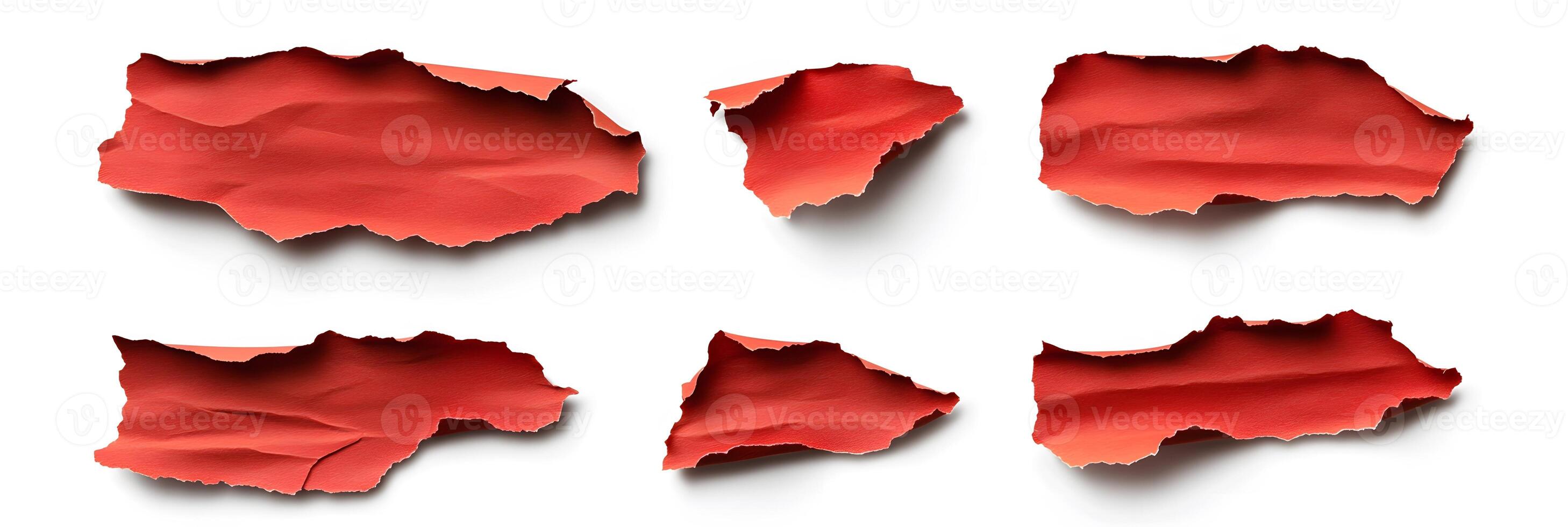 Six Torn Pieces of Red Paper on a White Background photo