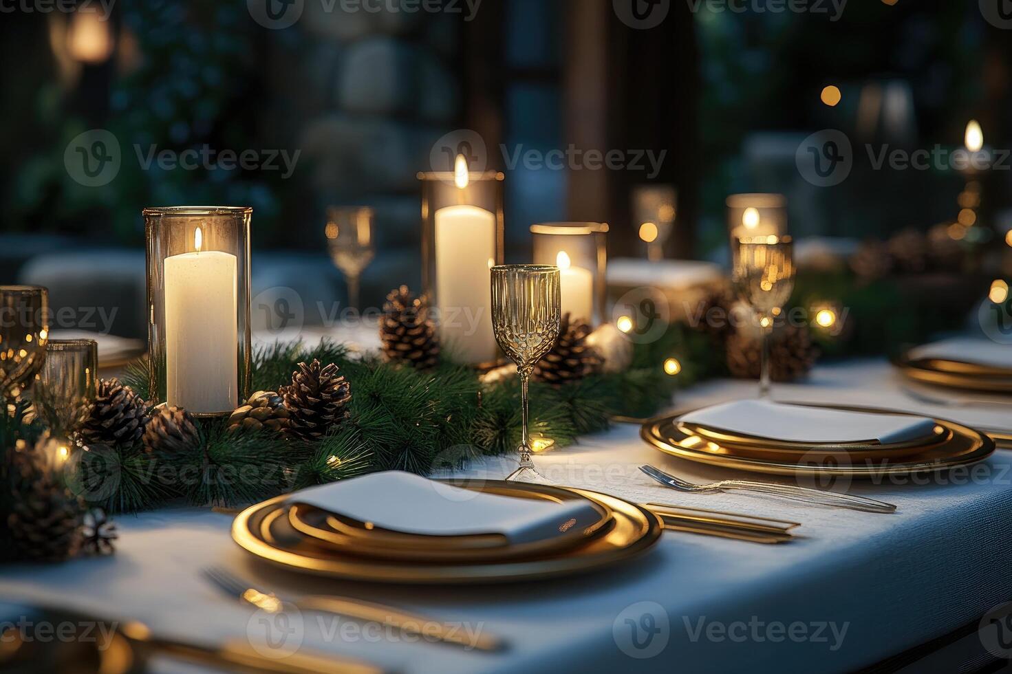 Christmas table setting decorated with candles, pine cones, and garland photo