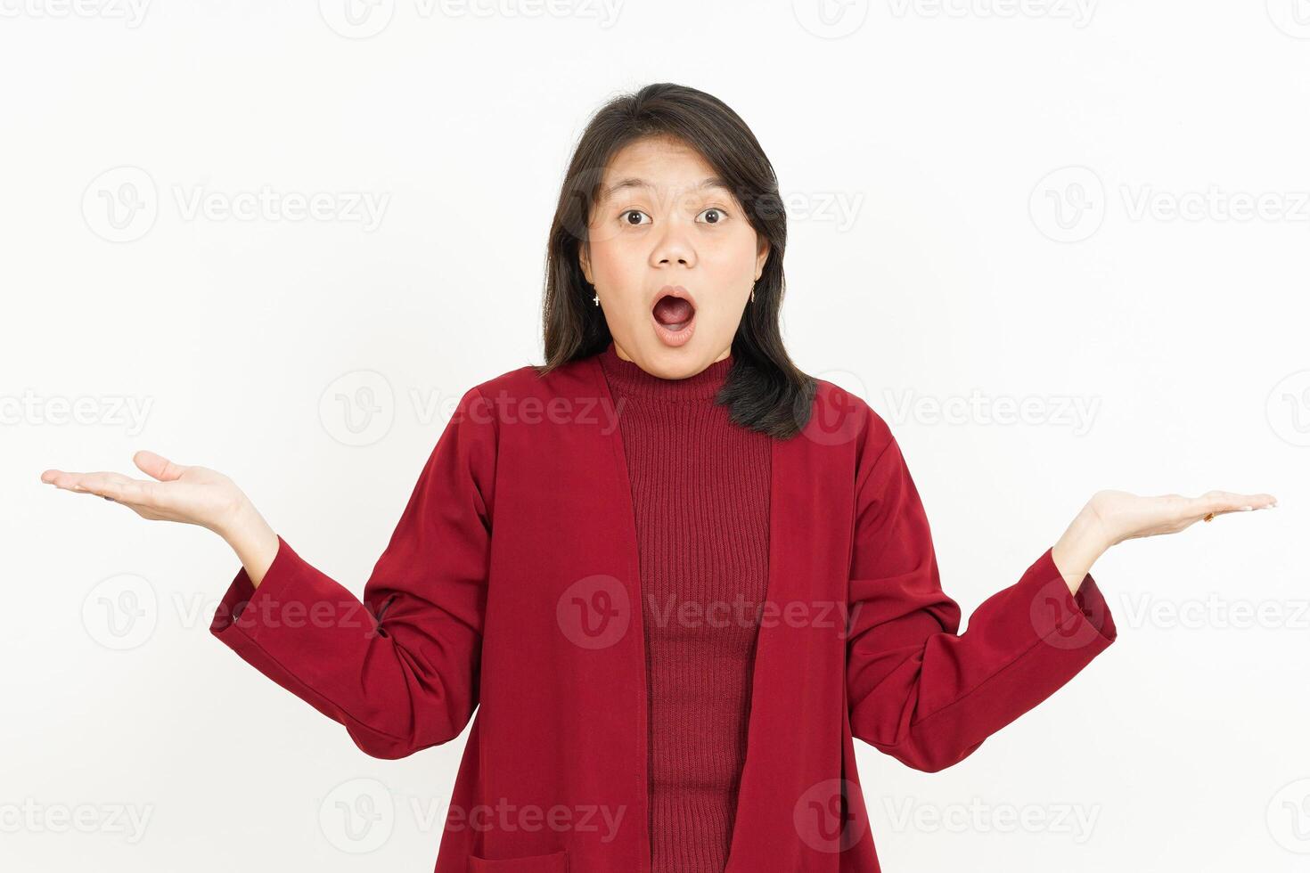 Showing two product on empty palm Of Beautiful Asian Woman Wearing Red Shirt Isolated On White photo