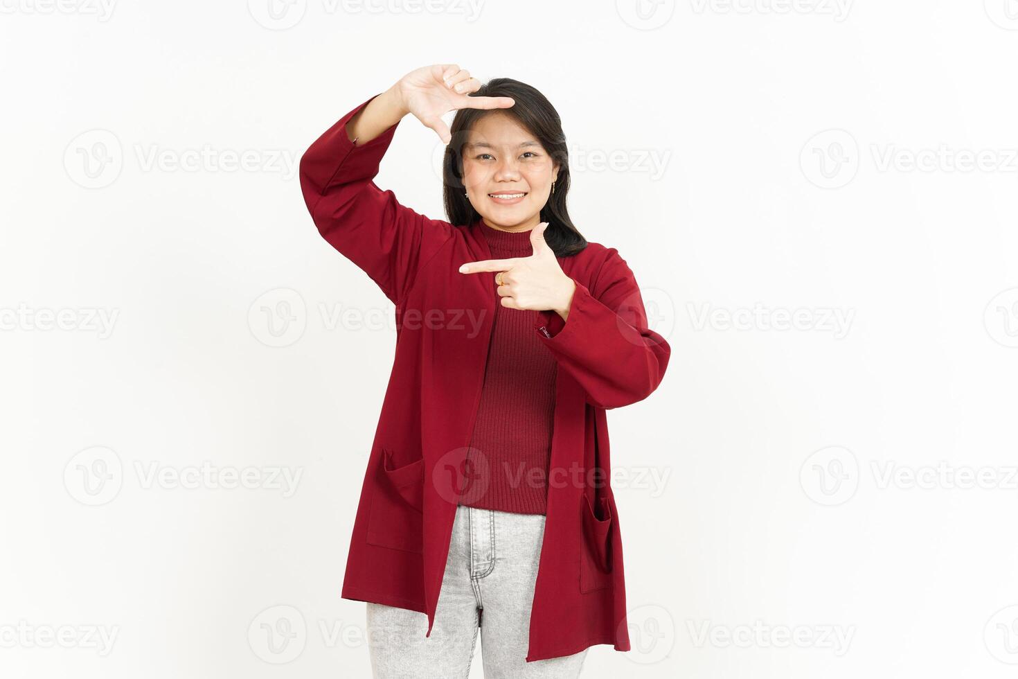 Making frame with hands Of Beautiful Asian Woman Wearing Red Shirt Isolated On White Background photo