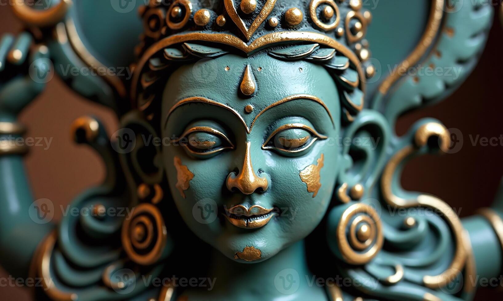 Ancient Hindu deity statue intricate bronze sculpture teal photo