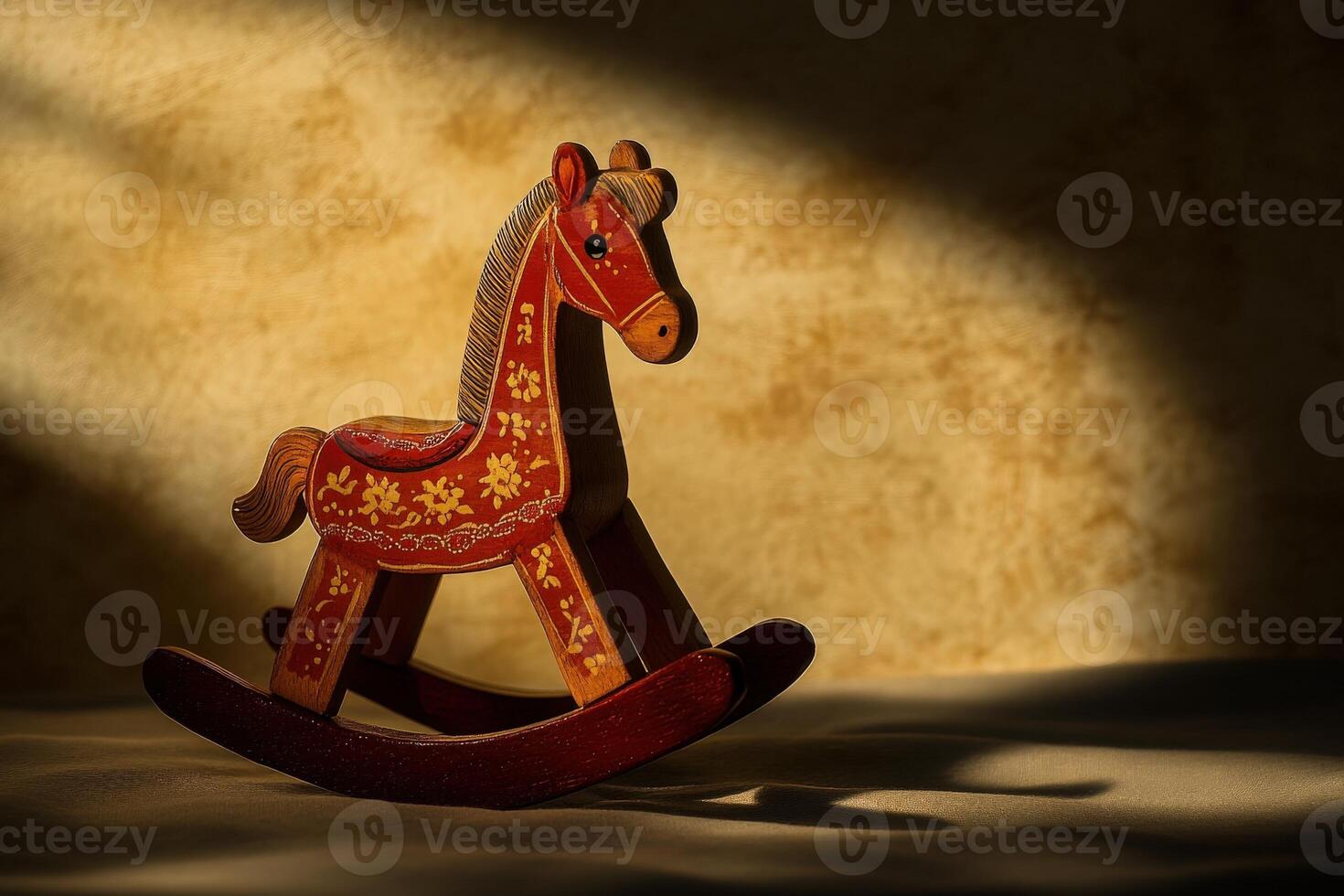 A beautifully crafted wooden rocking horse toy is illuminated by gentle sunlight, casting soft shadows on the warm-toned surface. The scene evokes a sense of nostalgia and childhood joy. photo
