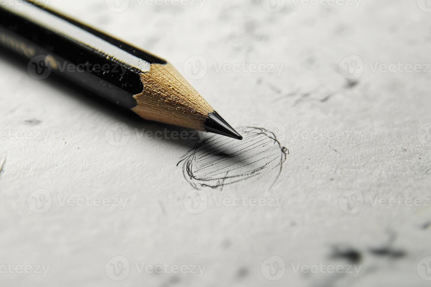 A pencil rests close to a lightly sketched outline on textured paper, symbolizing the intricate art of drawing. Shadows and lines hint at the artists developing vision and technique. photo