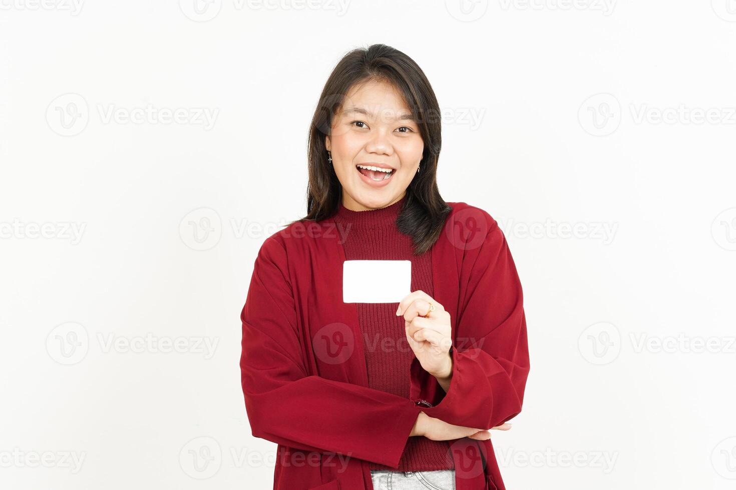 Holding and Showing Blank Credit Card Of Beautiful Asian Woman Wearing Red Shirt Isolated On White photo