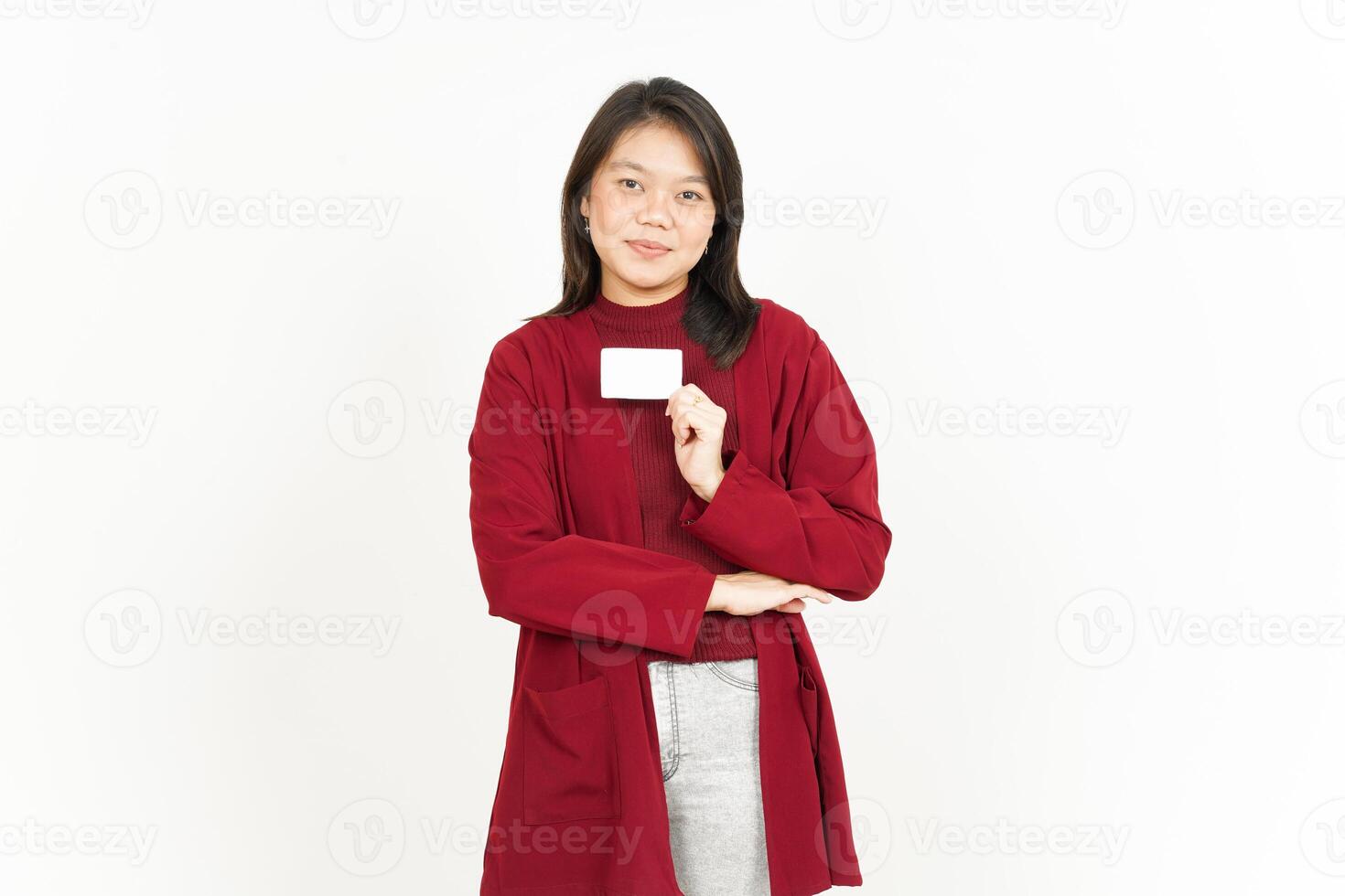 Holding and Showing Blank Credit Card Of Beautiful Asian Woman Wearing Red Shirt Isolated On White photo