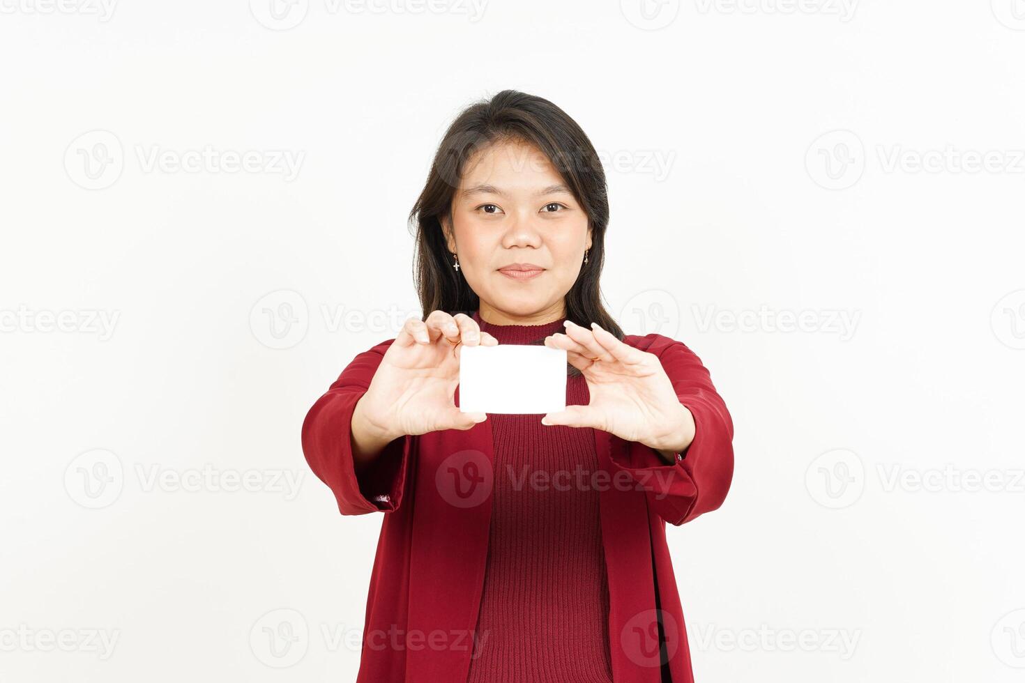 Holding and Showing Blank Credit or Bank Card Of Beautiful Asian Woman Wearing Red Shirt photo