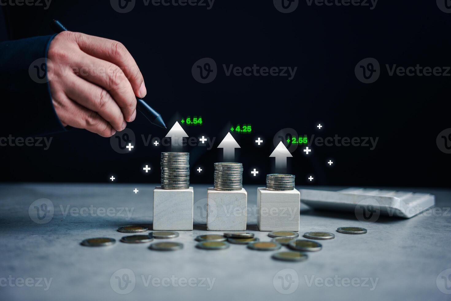 Businessmen use pen points to income and return on investment in a stack of coins. photo