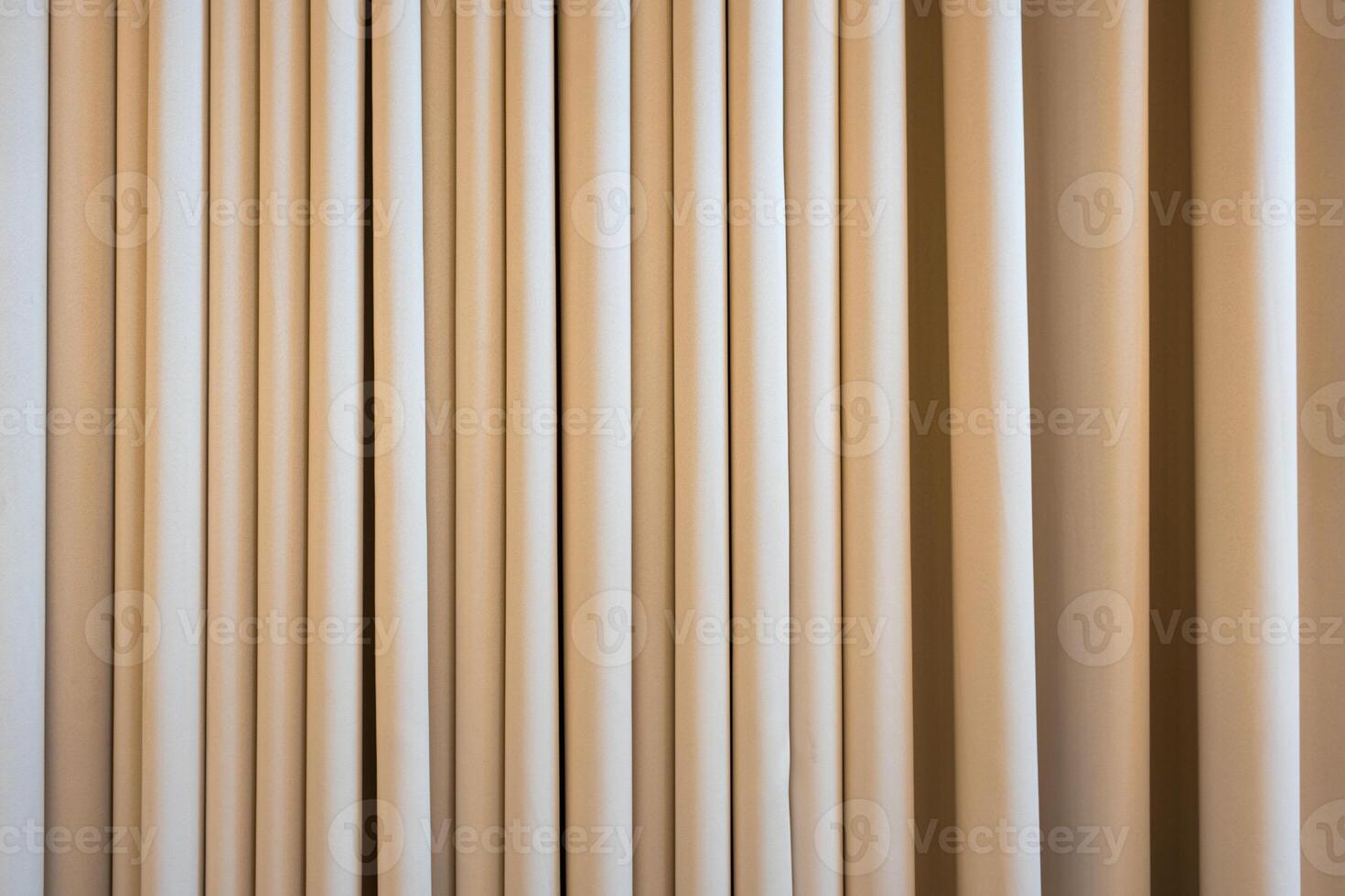 Cream colored cloth, beige curtain fabric texture and background. photo