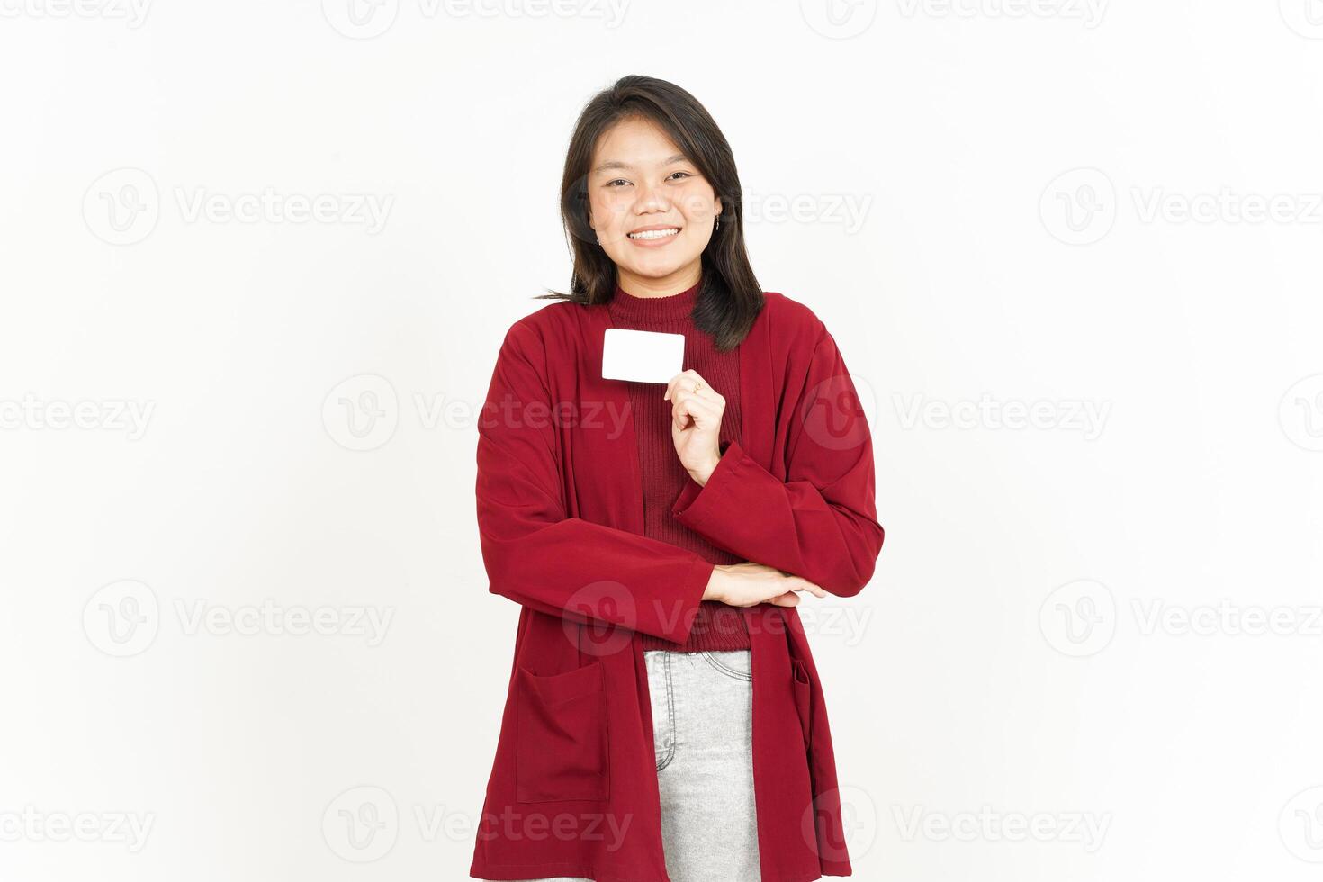 Holding and Showing Blank Credit or Bank Card of Beautiful Asian Woman Wearing Red Shirt photo