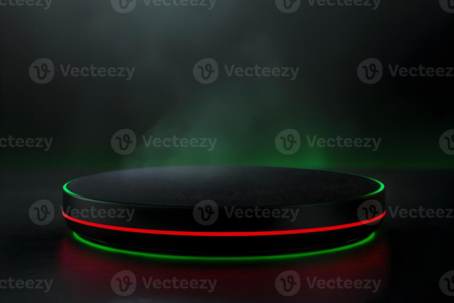 Illuminated circular platform with red and green neon lights, dark background. photo