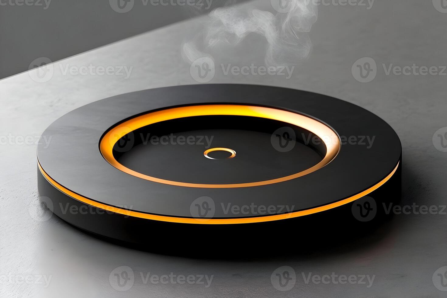 Illuminated black circular device emitting steam on grey surface. photo