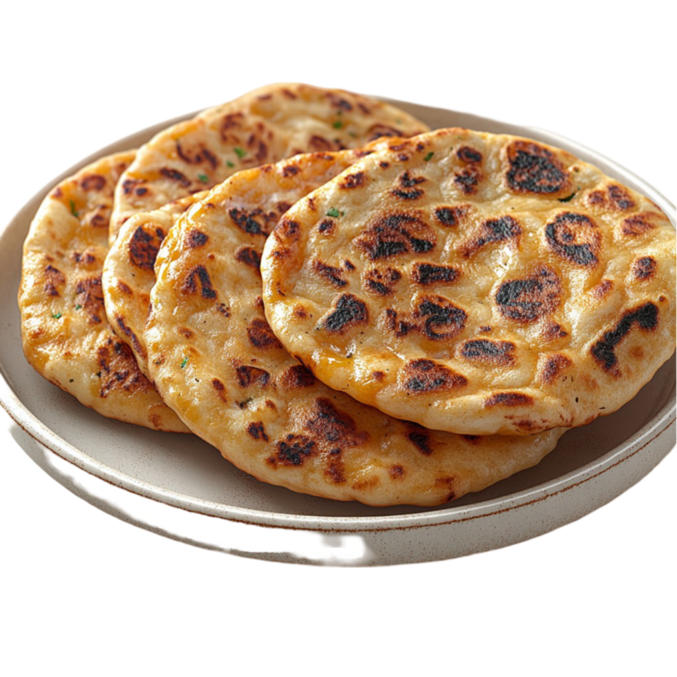Three flatbreads on a plate on a white table png