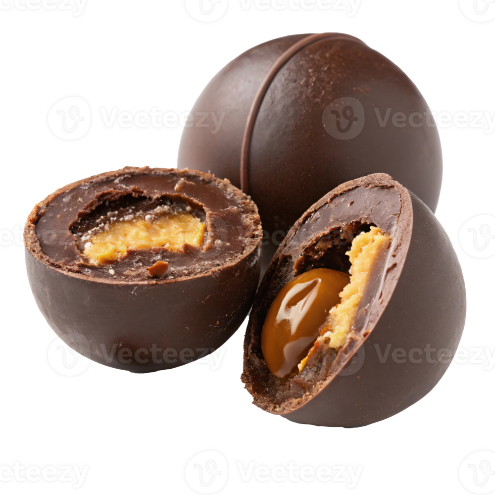 Close-up of chocolate truffles with caramel and peanut butter filling. png