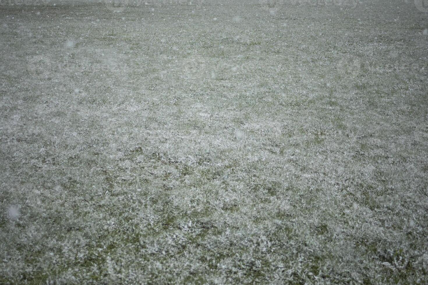 The first snow outside. The beginning of a snowstorm. Snow cover. A change in the weather. photo