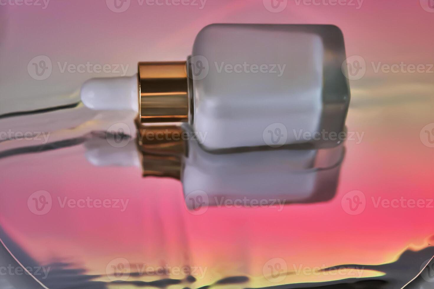 White serum with a pipette in water with a sunset atmosphere. photo