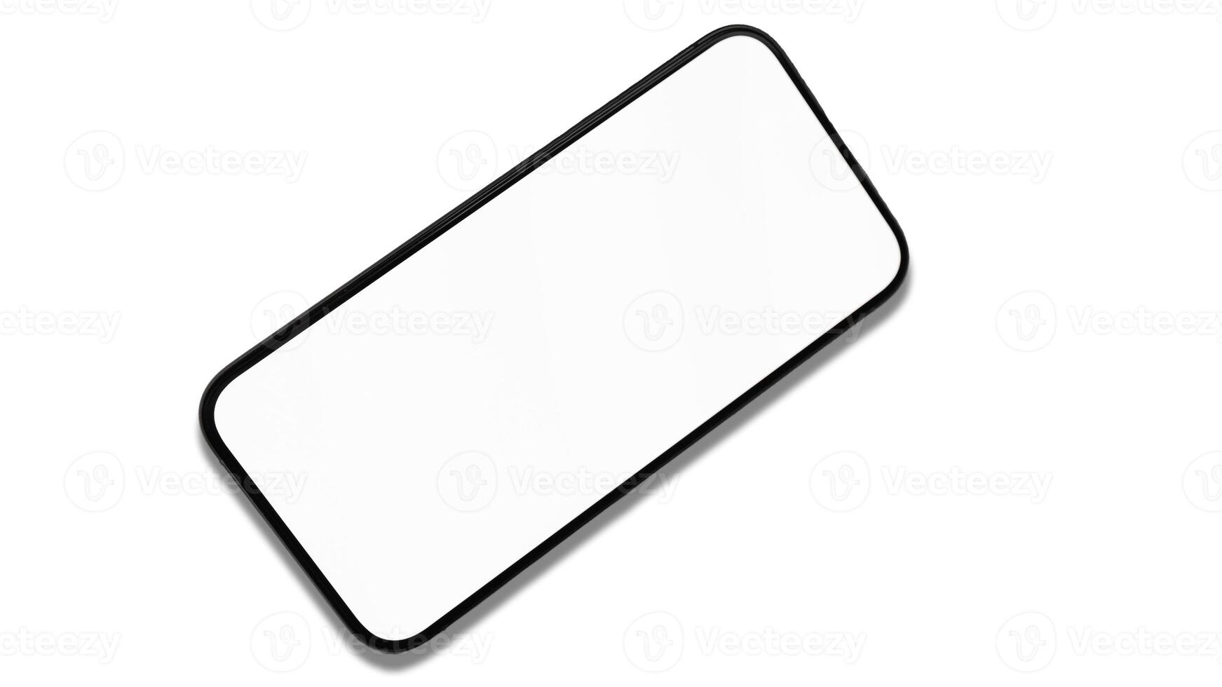 Mock-up phone with white blank screen on the table near the laptop photo