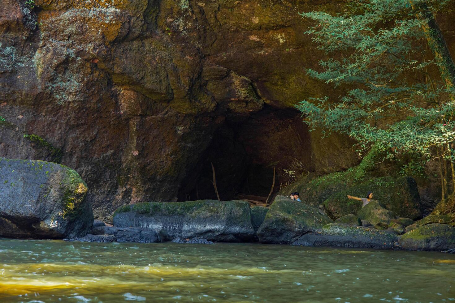 Forest River with Cave and Rocky Terrain. National park, Thailand. photo
