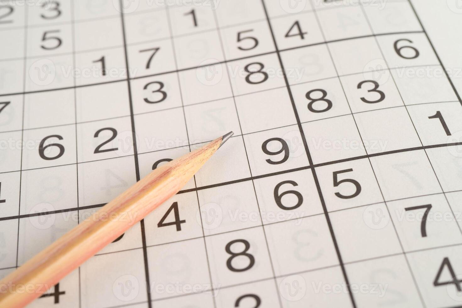 Sudoku puzzle, game to play for keep you brain younger for developing Alzheimer disease in senior patient. photo