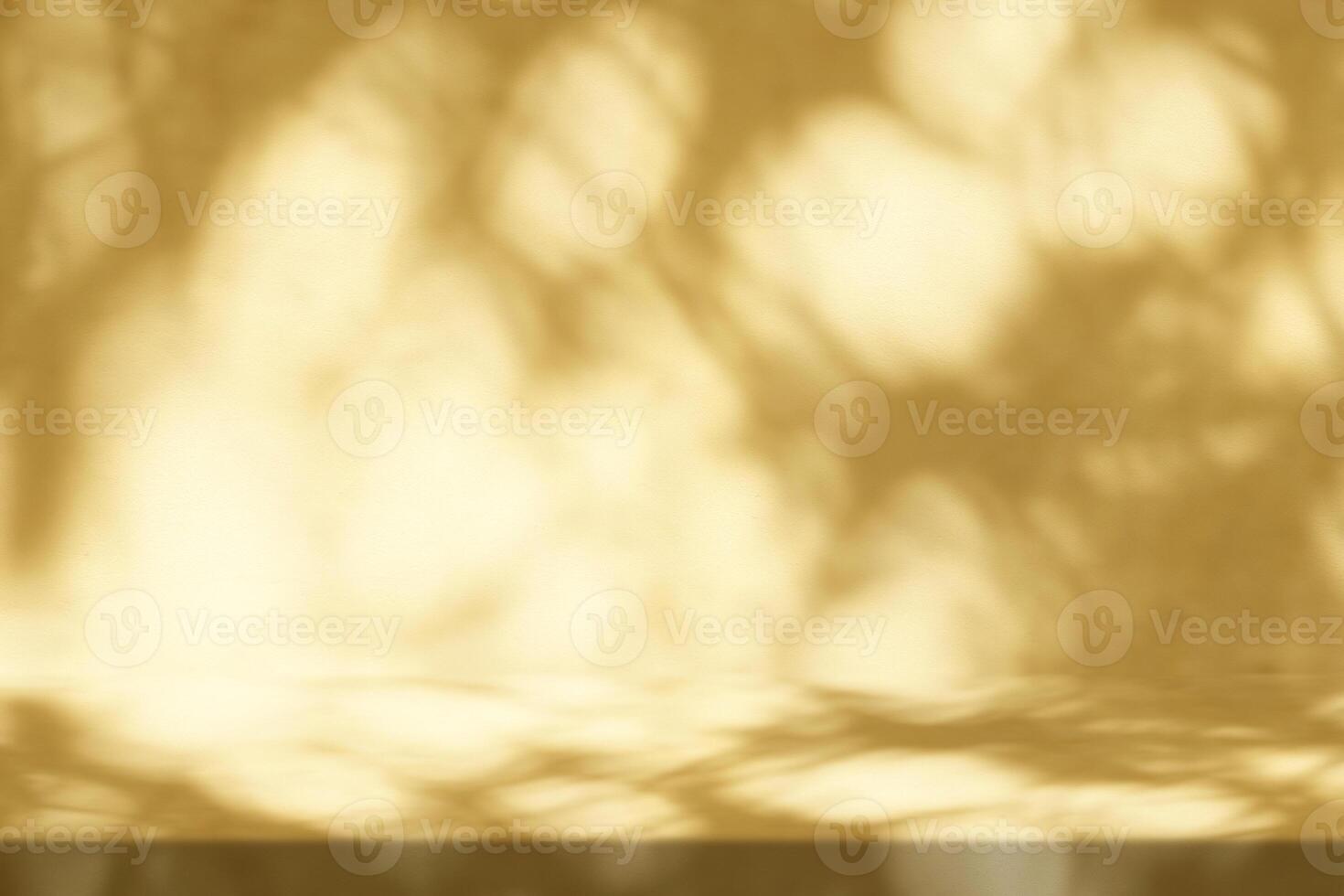 Gold Stucco Table with Christmas Leaves Shadow on Concrete Wall Texture Background photo