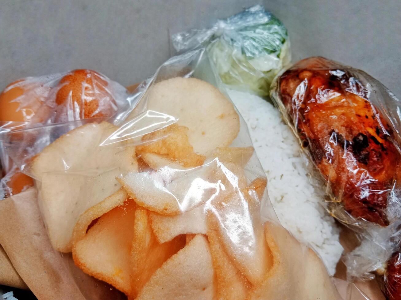 Indonesian called Rice Box or Nasi kotak photo