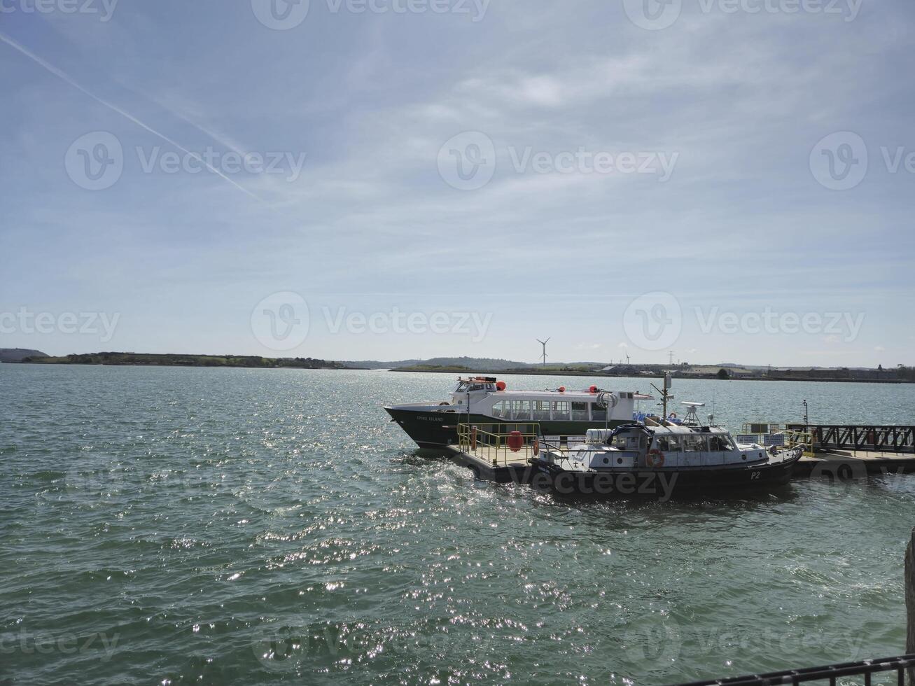 Boat on Lake Under Cloudy Sky photo