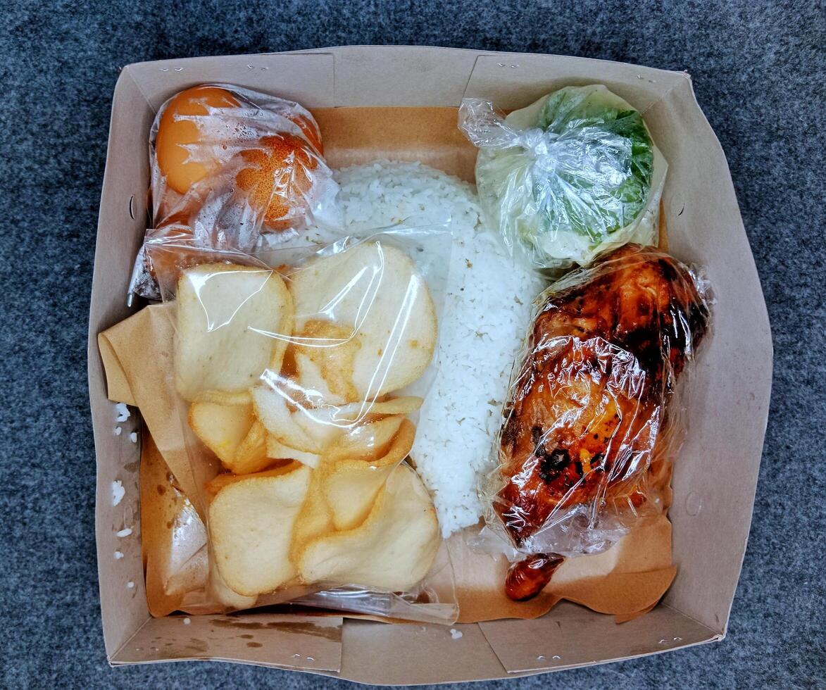 In Indonesian it is called Rice Box or Nasi kotak photo