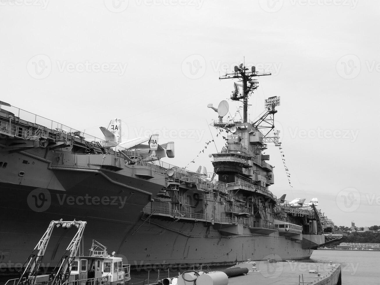 Navy Battle Ship With Guns and Other Weapons Background photo