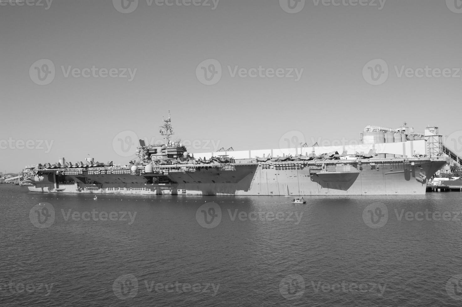 Navy Battle Ship With Guns and Other Weapons Background photo