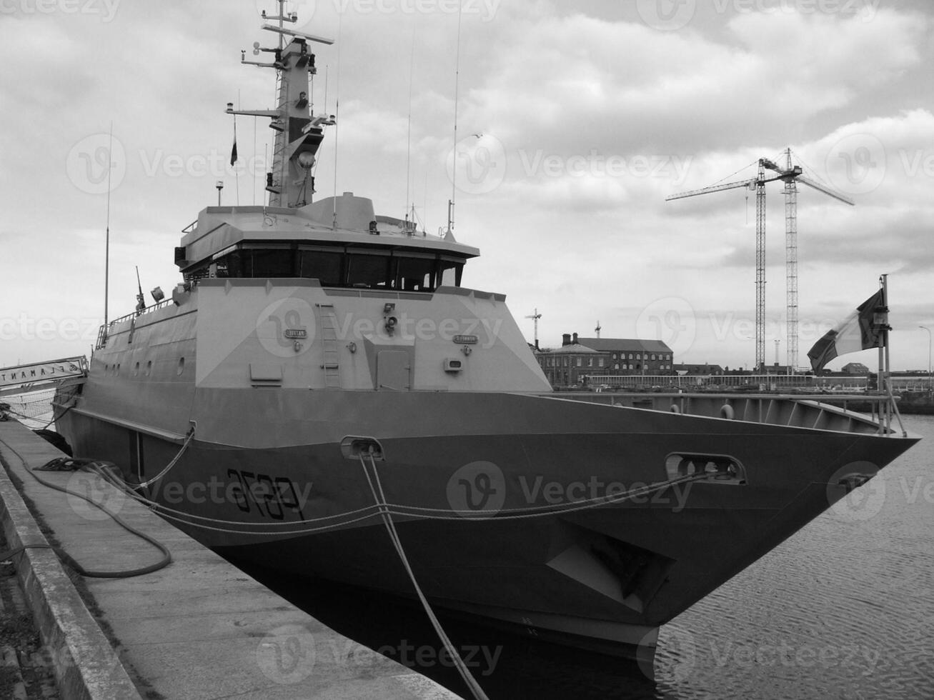 Navy Battle Ship With Guns and Other Weapons Background photo