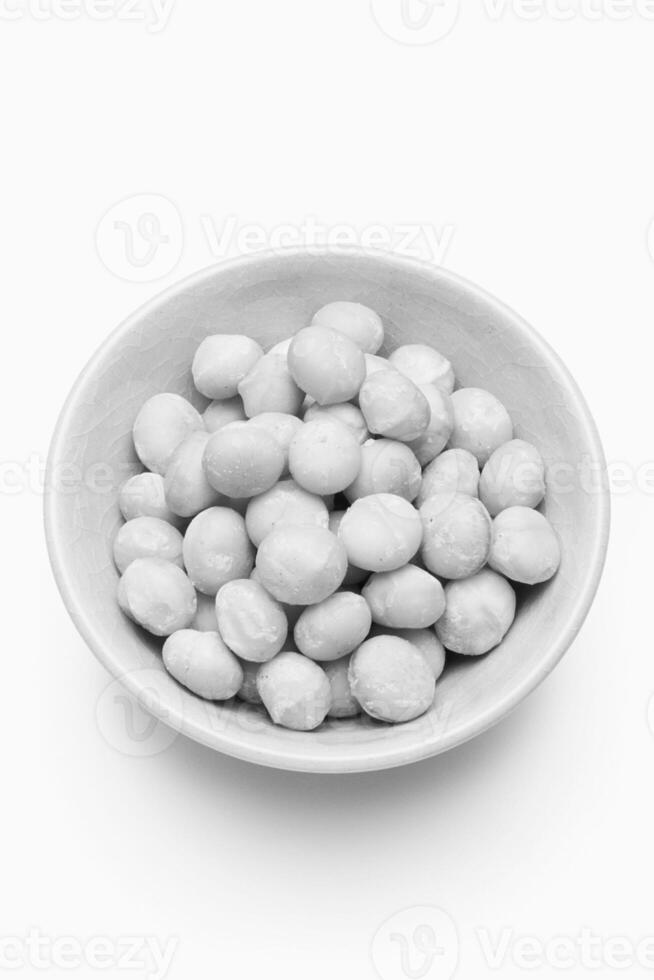 Roasted Macadamia Nuts in White Bowl photo
