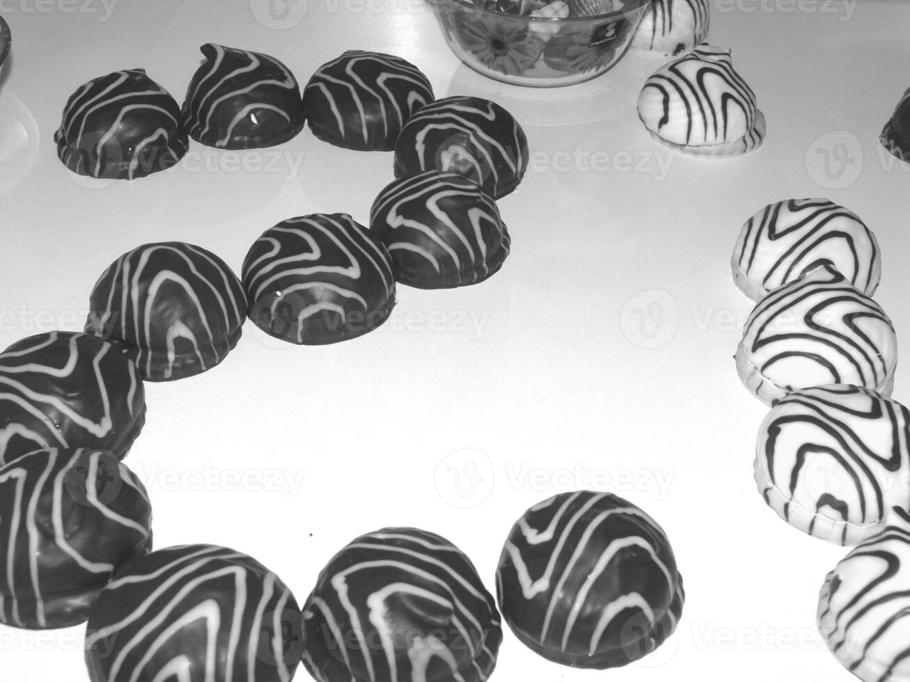 Elegant Chocolate-Dipped Zebra Cookies for Festive Gatherings photo